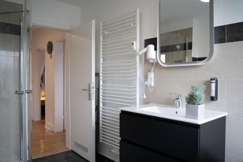 Koupelna v ubytování JUNIK Apartments Oberhausen