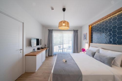 Кровать или кровати в номере Olea Nova Hotel