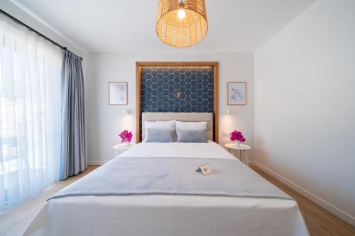 Кровать или кровати в номере Olea Nova Hotel