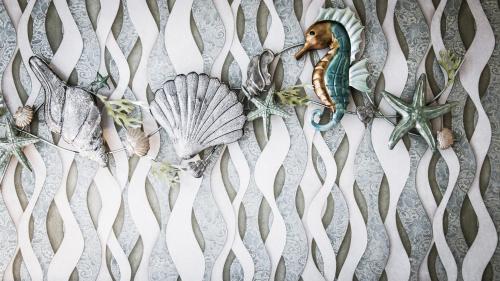 a group of seashells on a wall at The Phu Beach Hotel - SHA Plus in Ao Nang Beach