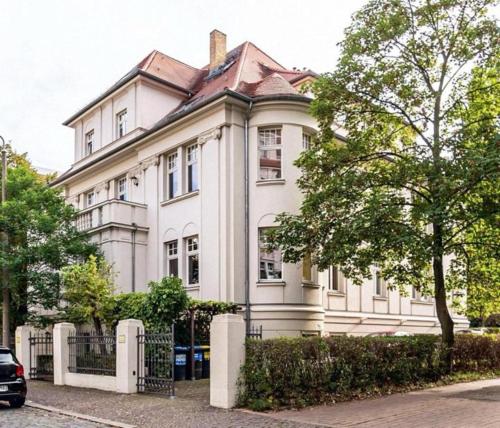 Villa 18 Boutique Apartment mit Gartenblick kostenfreies Parken Zoo und Zentrum fußläufig