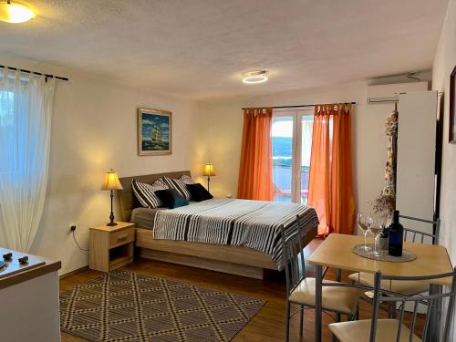 Posteľ alebo postele v izbe v ubytovaní Apartments Stela