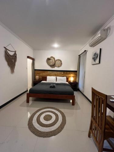 Cama o camas de una habitación en ODA Guest House Ubud