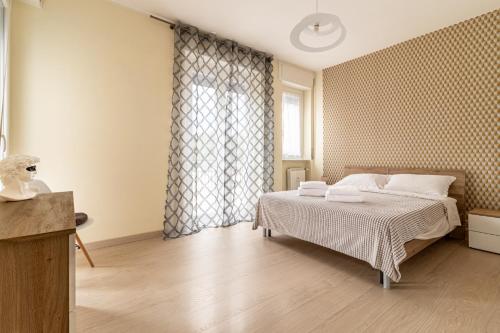 Postel nebo postele na pokoji v ubytování Best Apartment in Cossato