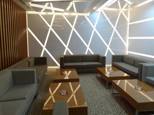 a living room with two couches and a table at Best Inn Erbil in Erbil