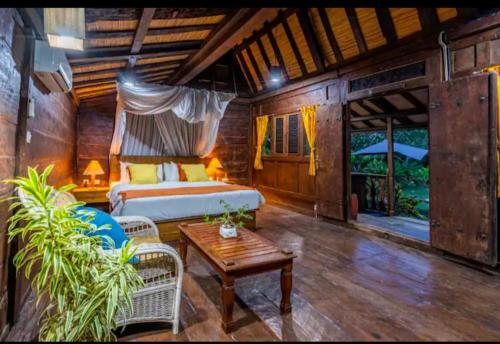 Ένα ή περισσότερα κρεβάτια σε δωμάτιο στο Bungalow Soka