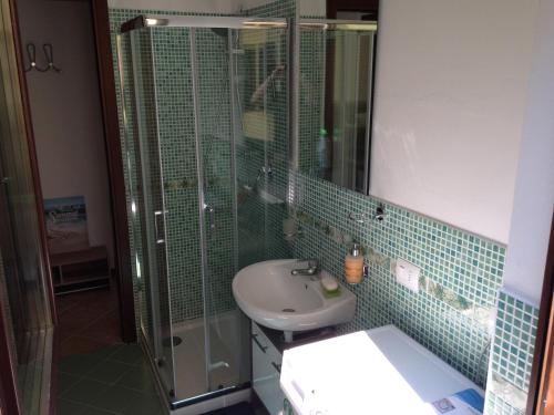 Et badeværelse på La Quiete Anna Apartment