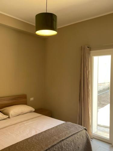 Postel nebo postele na pokoji v ubytování Guest House Da Roby