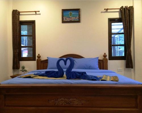 Кровать или кровати в номере Dachatorn Village