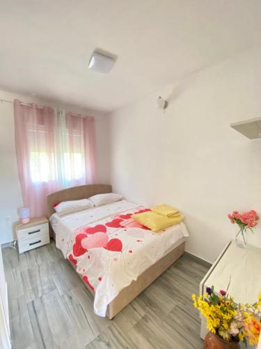 Postel nebo postele na pokoji v ubytování OLGA APARTMENT