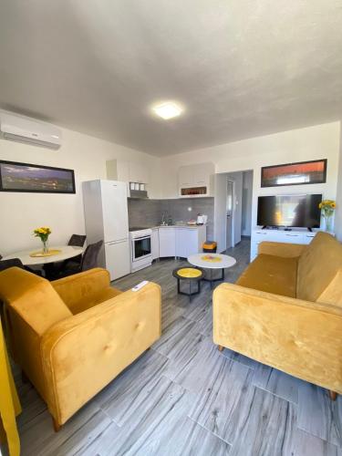Kuchyň nebo kuchyňský kout v ubytování OLGA APARTMENT