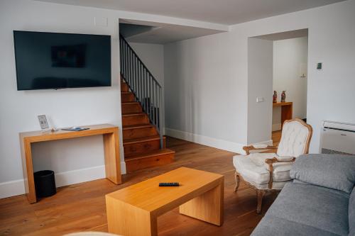 TV a/nebo společenská místnost v ubytování Hotel Boutique Palacio Corredera