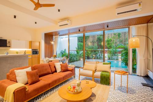 Posezení v ubytování ELIVAAS 3 BHK with Pvt Pool - Mirai Taurus