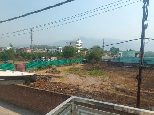 a view from a window of a construction site at Purnotsav in Rishīkesh