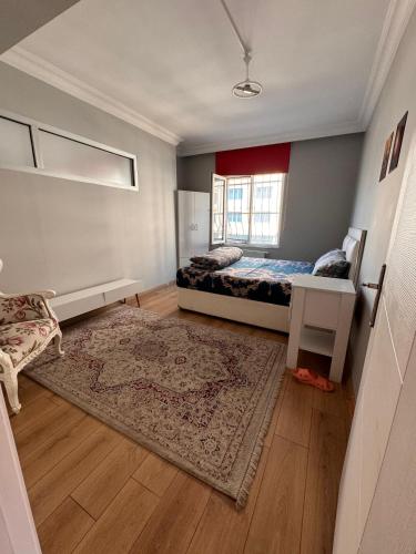 a bedroom with a bed and a window at Transit 77 in Istanbul