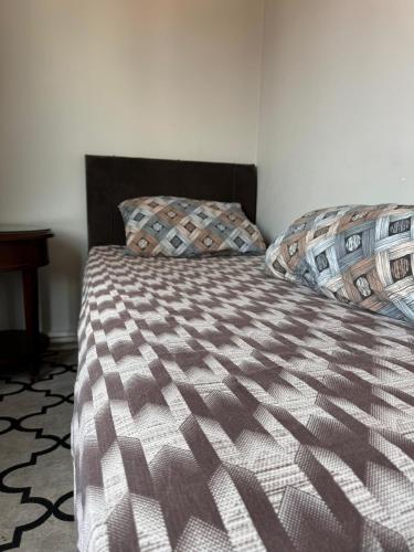 a bedroom with a bed and a table in it at Transit 77 in Istanbul
