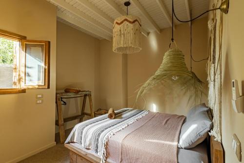 Postel nebo postele na pokoji v ubytování Mannam apartment boho