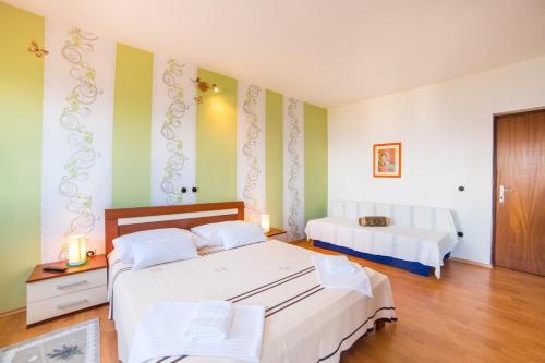 Postel nebo postele na pokoji v ubytování Apartment Mande