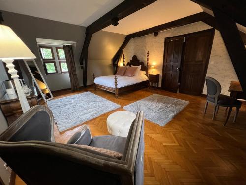 Postel nebo postele na pokoji v ubytování Chateau Mariande