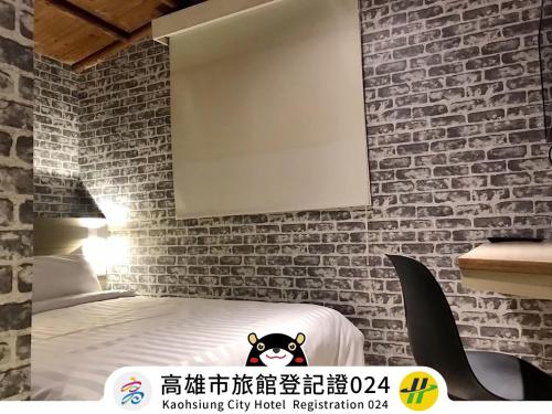 Cama o camas de una habitación en Win Inn Kaohsiung Hotel