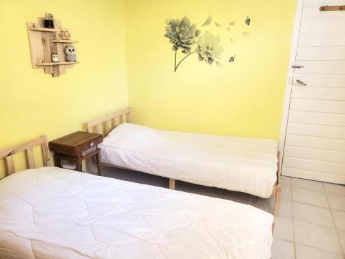 Postel nebo postele na pokoji v ubytování L'idylle du Vercors