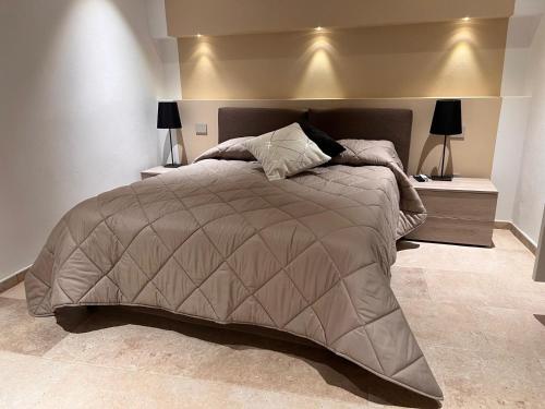 Ένα ή περισσότερα κρεβάτια σε δωμάτιο στο Mia Margot Suite Apartment