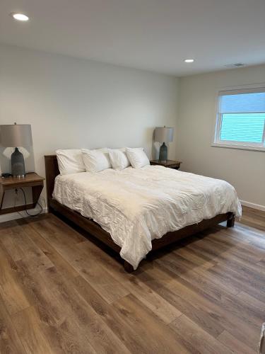 a bedroom with a large bed and two night stands at Lakeview Hills Golf & Resort in Lexington