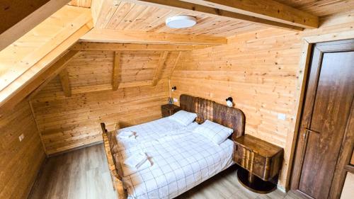 Postel nebo postele na pokoji v ubytování Cabana din Deal