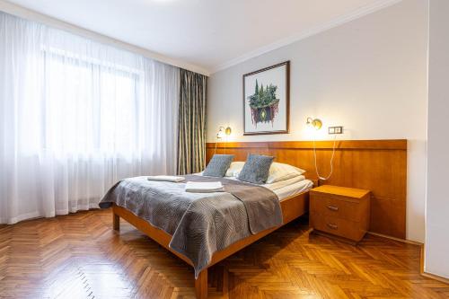 Posteľ alebo postele v izbe v ubytovaní WILLA ORNAK