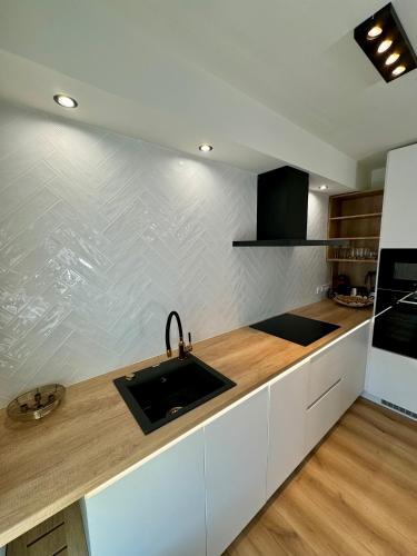 Η κουζίνα ή μικρή κουζίνα στο The Modern Loft
