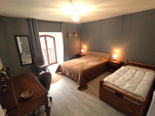 Postel nebo postele na pokoji v ubytování Charmante maison calme et agréable Lunel