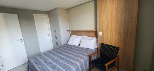 En eller flere senge i et værelse på Blue Beach Praia Formosa