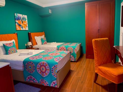 Ένα ή περισσότερα κρεβάτια σε δωμάτιο στο Art Green Boutique Hotel