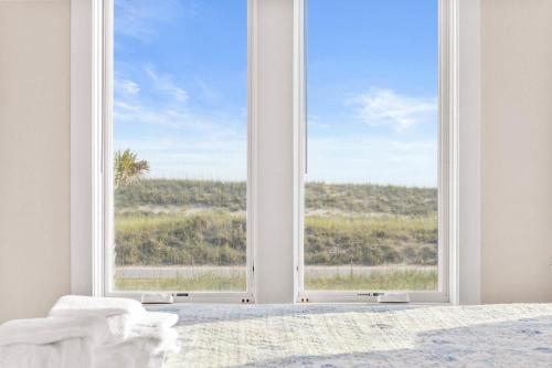 an open door with a view of a bedroom at Jailbreak in Southport