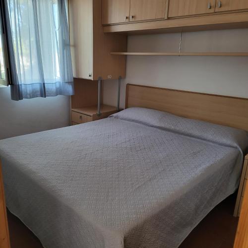 Ένα ή περισσότερα κρεβάτια σε δωμάτιο στο Residence Dolce Far Niente
