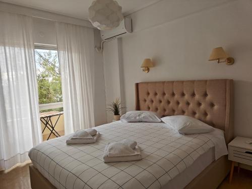 Postel nebo postele na pokoji v ubytování Hotel Rania