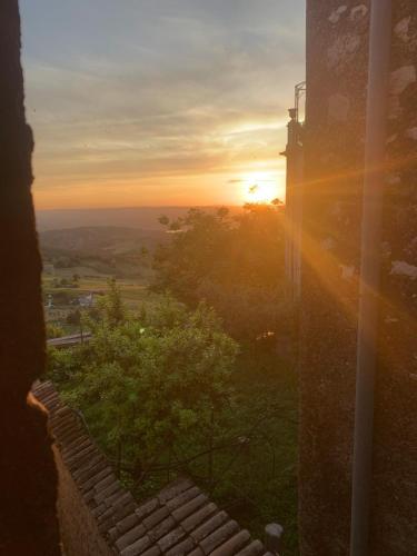 a sunset seen from a window of a building at Il nido dell'aquila-Lugnano in Teverina in Lugnano in Teverina