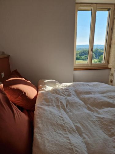 Ένα ή περισσότερα κρεβάτια σε δωμάτιο στο Maison Aurinko