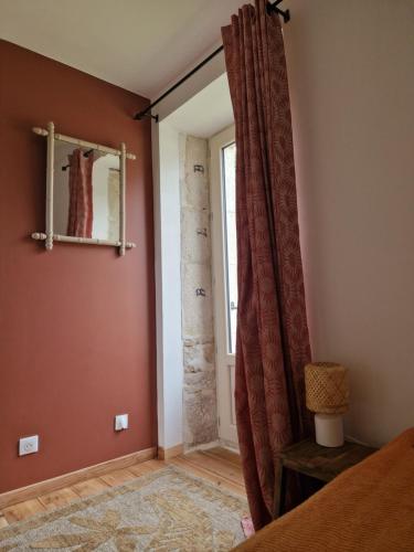 Ένα ή περισσότερα κρεβάτια σε δωμάτιο στο Maison Aurinko