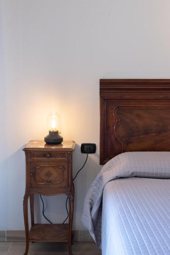 Postel nebo postele na pokoji v ubytování Dimora & Spa Il Cerchio di Lullo