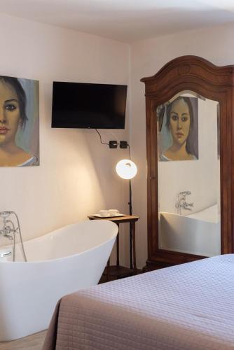 Postel nebo postele na pokoji v ubytování Dimora & Spa Il Cerchio di Lullo