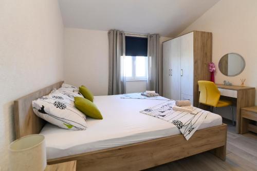 Postel nebo postele na pokoji v ubytování Vacation house Ulika