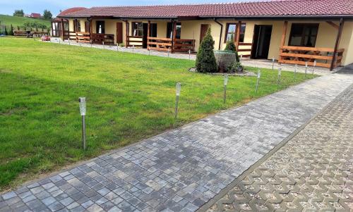 Afbeelding uit fotogalerij van Bursztynowe Zacisze Domek 2 Chłopy ul Turystyczna 6 in Chłopy