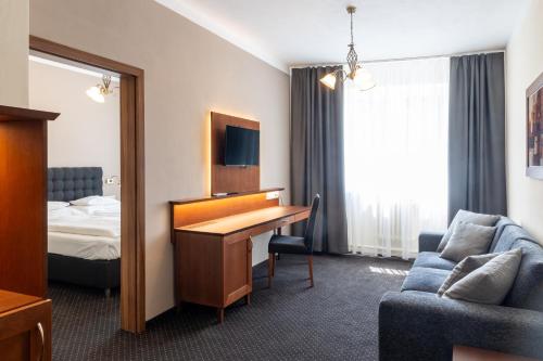 Posteľ alebo postele v izbe v ubytovaní Hotel Polana
