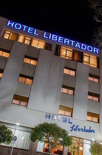 a hotel deterioration sign on the front of a building at Hotel Libertador in Trelew