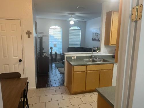 a kitchen with a sink and a counter top at 3 Bed 3 Bath Townhome in Tallahassee