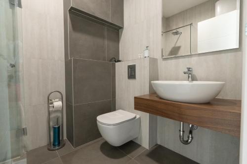 Baðherbergi á Kondina Suites