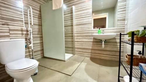 Kúpeľňa v ubytovaní Apartamentos Pintor Losada