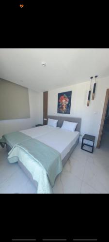 Katil atau katil-katil dalam bilik di IOLENA Seaview Apartment