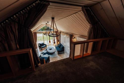an overhead view of a living room in a house at Paežerės istorijos, Druskininkai in Veršiai